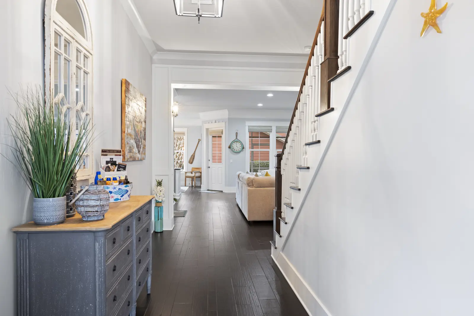 Bright home entry hall with staircase