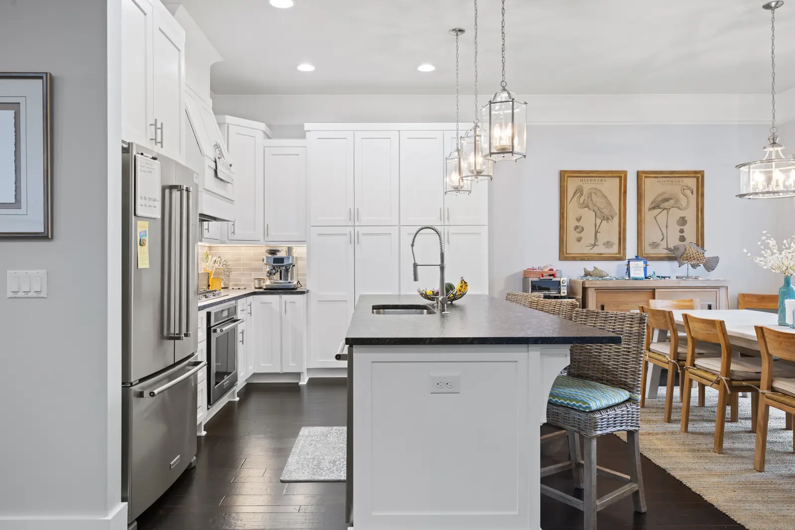 Kitchen and dining area with dark wood floors
